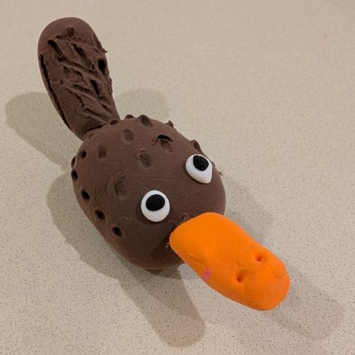 Platypus with brown body and orange beak